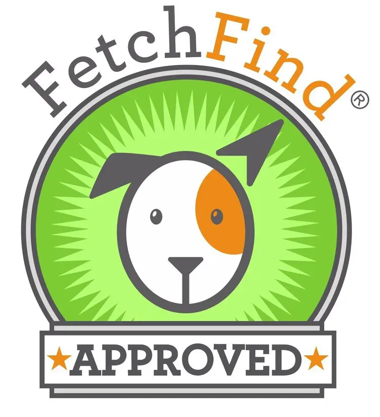 A green badge with an orange dog in the center.